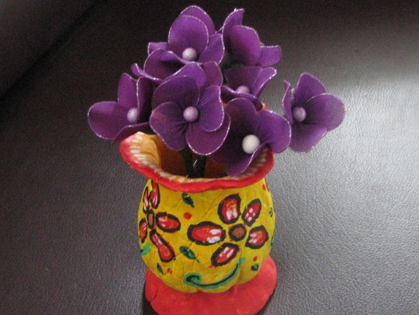 Clay Pot with Stocking Flowers